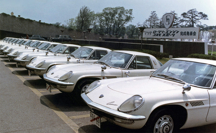 Mazda 110Ss lined up (known as Cosmo Sport in Japan)